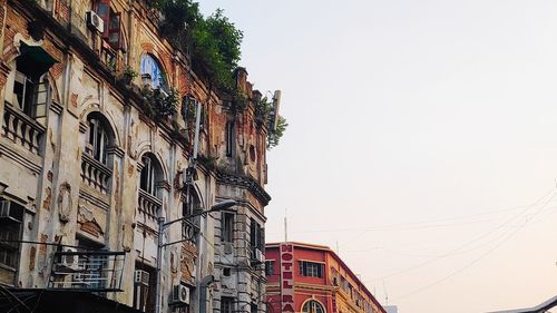 Low angle view of old building against sky