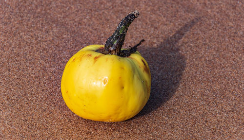 Close-up of lemon on table