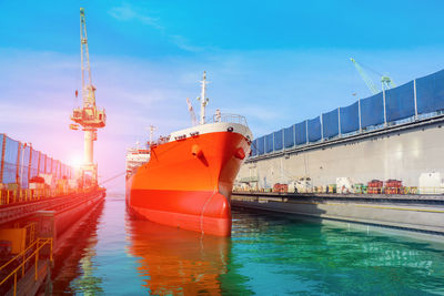 View of commercial dock against sky