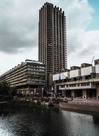 Low angle view of buildings against sky in city