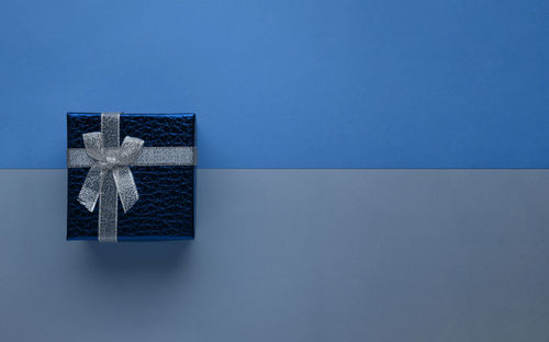 Fire hydrant against blue background