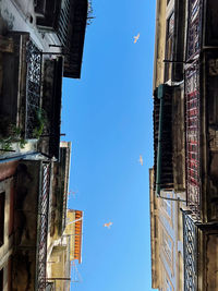 Low angle view of buildings against sky