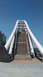 Low angle view of building against clear blue sky