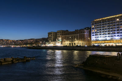 Night photo of illuminated seafront caracciolo in napoli