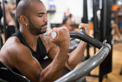 Full length of young man looking outdoors