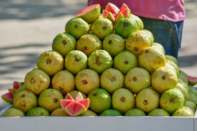 Close-up of guavas for sale at market stall