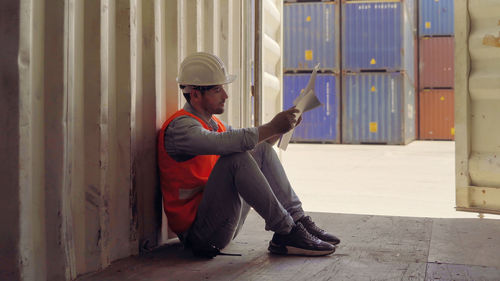 Side view of a man working