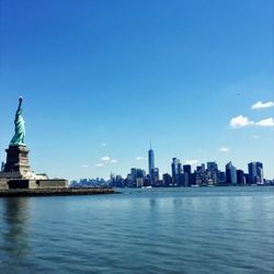 Statue of liberty against sky and the new york bay