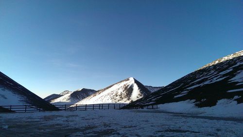 Snow covered mountain against sky