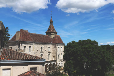 View of historical building against cloudy sky