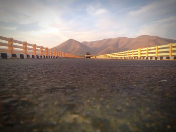 Surface level of road against mountains