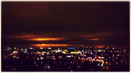 Illuminated cityscape at night