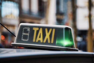 Close-up of taxi sign