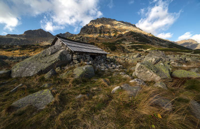 Panoramic view of rocky mountains against sky