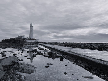 Lighthouse against cloudscape