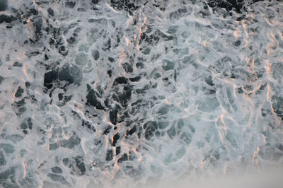 High angle view of ice on beach