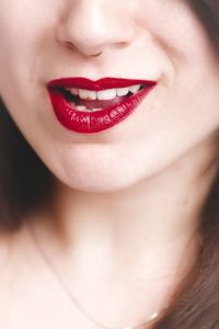 Cropped image of woman with red lipstick