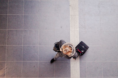 Directly above shot of person walking on walkway