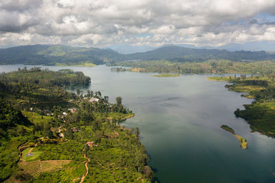 Aerial drone of lake in the mountains among the tea plantations. maskeliya, 