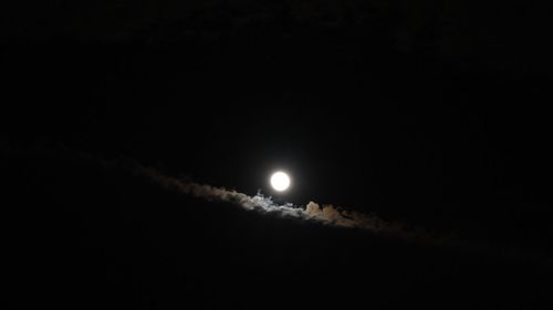 Scenic view of moon against sky at night