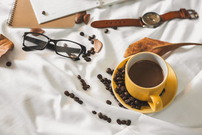 High angle view of coffee cup on table