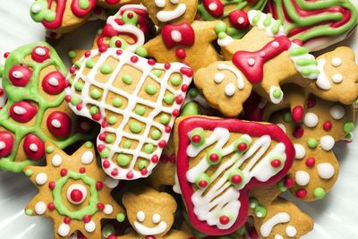 Directly above shot of colorful christmas cookies in plate