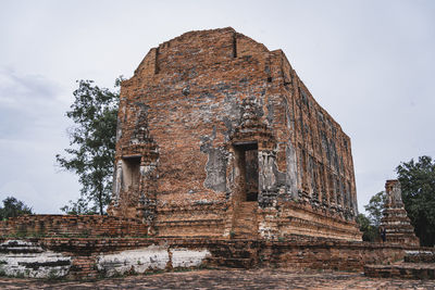 Low angle view of old building against sky