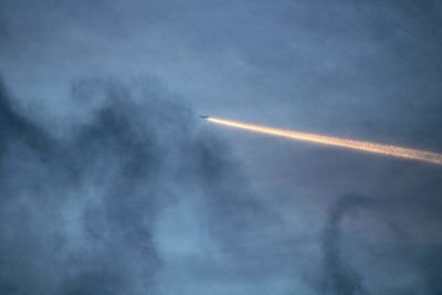 Low angle view of vapor trails in sky