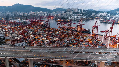 Container ship loading and unloading in sea port