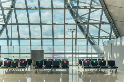 Low angle view of empty seats at airport