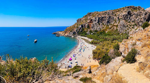 Scenic view of sea against clear blue sky