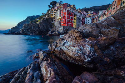 Scenic view of sea and rocks against sky