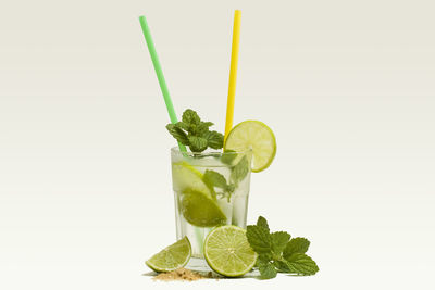 Close-up of drink against white background