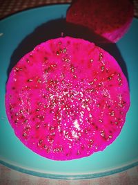 High angle view of pink fruits on table