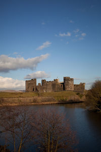 Castle against cloudy sky