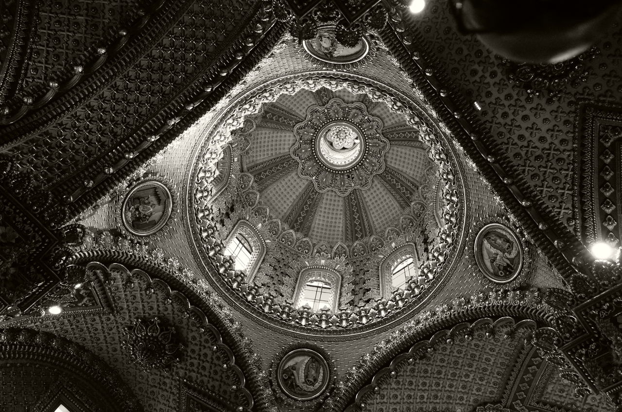black, indoors, black and white, ceiling, pattern, monochrome, no people, low angle view, darkness, monochrome photography, architecture, ornate, religion, belief, close-up, built structure, spirituality, place of worship, full frame