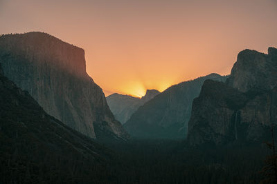 Scenic view of mountains against sky during sunset