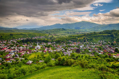 Scenic view of landscape and mountains against sky