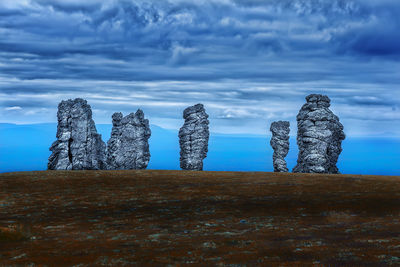 View of rock formation against sky