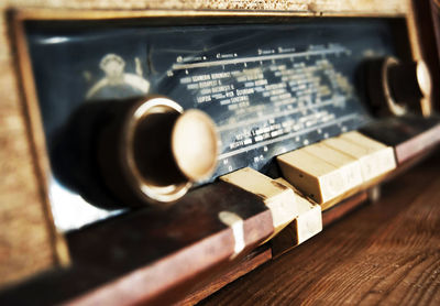 Close-up of old radio on table