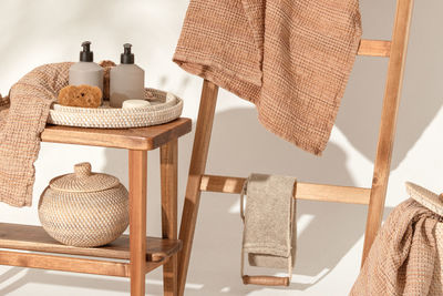 Close-up of chairs on table at home