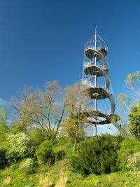 Low angle view of water tower against clear sky