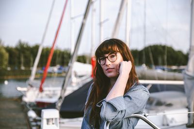 Portrait of young woman in sunglasses