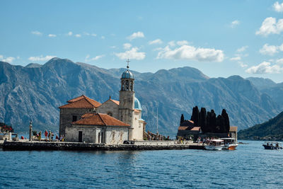 Panoramic view of lake against cloudy sky