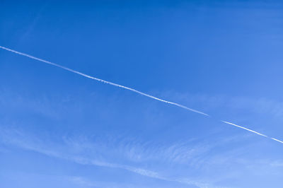 Low angle view of vapor trail in sky