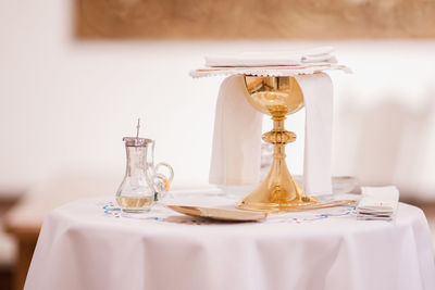 Close-up of chalice on table