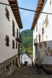 Alley amidst buildings in town