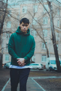 Full length of young man standing in park