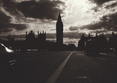 City street against cloudy sky