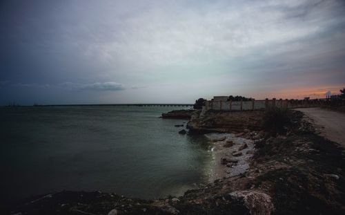 Scenic view of sea against sky at sunset